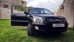 كيا سبورتاج 2006 محرك27 v6   4wD (المطر خيرات هذا وقتها مع الغدير ماليك إلا)