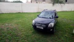 كيا سبورتاج 2006 محرك27 v6   4wD (المطر خيرات هذا وقتها مع الغدير ماليك إلا)